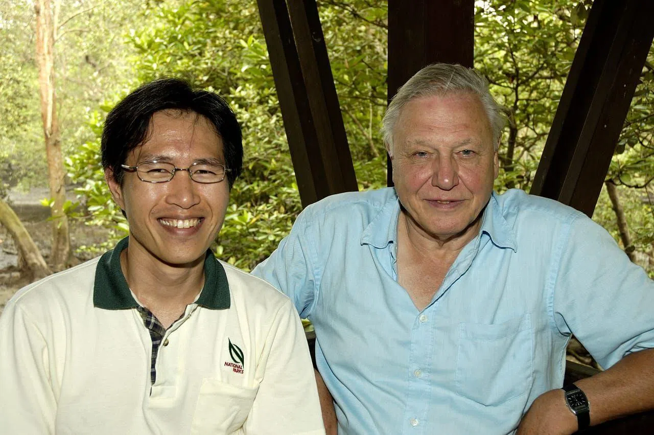 Mr James Gan (left), NParks’ principal researcher for forest ecology, with Mr Attenborough at Sungei Buloh Wetland Reserve in 2006.