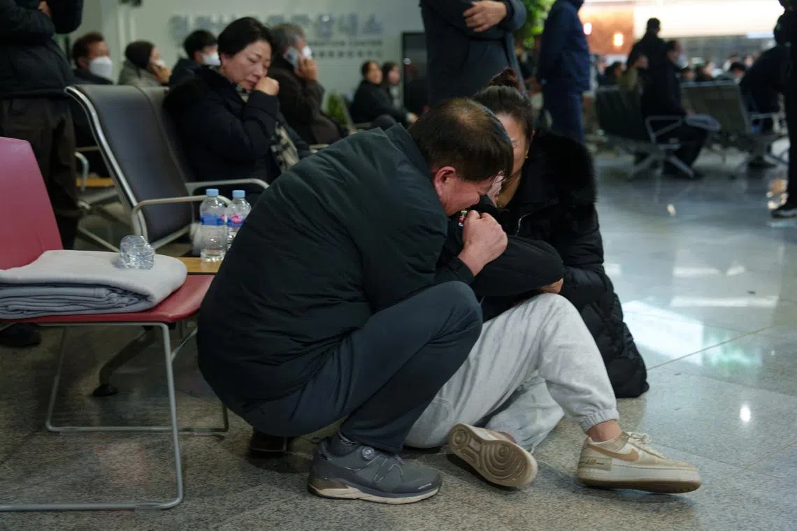 Grieving relatives of passengers on the Jeju Air flight, which crashed at Muan International Airport in South Korea on Dec 29.