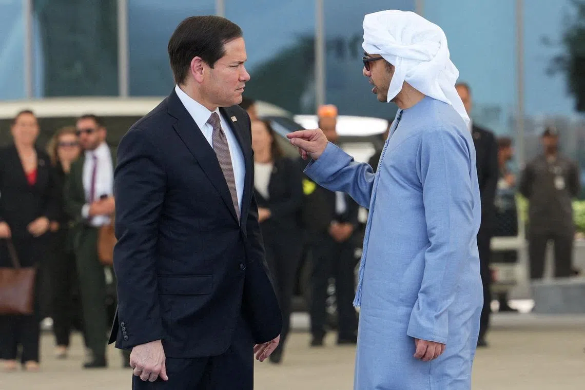 U.S. Secretary of State Marco Rubio talks to the United Arab Emirates' Foreign Minister Sheikh Abdullah bin Zayed bin Sultan Al Nahyan before boarding a U.S. Air Force C-17 Globemaster III transport aircraft at Al Bateen Executive Airport, en route to Kuwait during his visit to the Middle East to discuss the interim deal between the U.S. and Iran with Arab Gulf allies, in Abu Dhabi, United Arab Emirates, June 24, 2026. REUTERS/Eric Lee/Pool