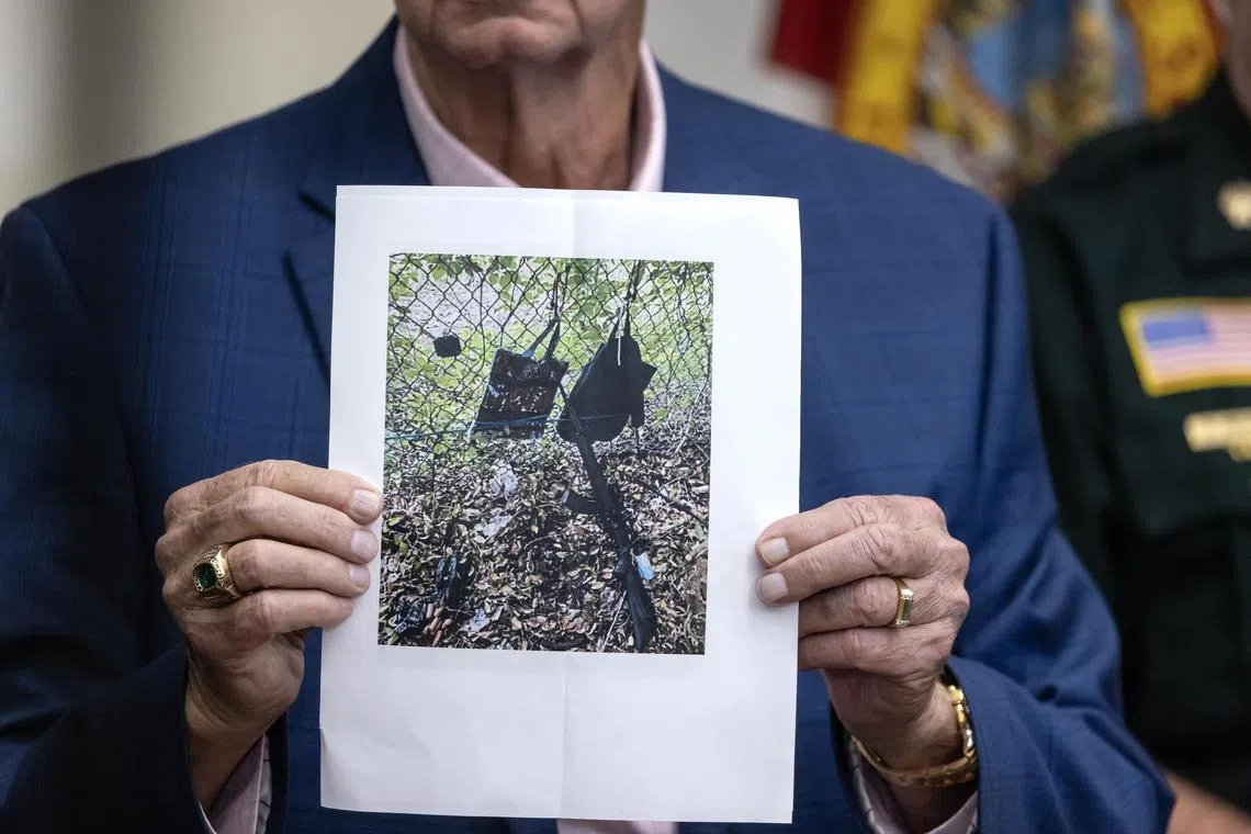 West Palm Beach Sheriff Task Force Contact Sheriff Ric L. Bradshaw showing a picture of an AK-style rifle with a scope, and bags found by the Secret Service at the Trump International Golf Club in in West Palm Beach, Florida, USA on 15 September 2024.  According to the FBI, they are following an investigation of what appears to be an attempted assassination of Former President Donald Trump. 