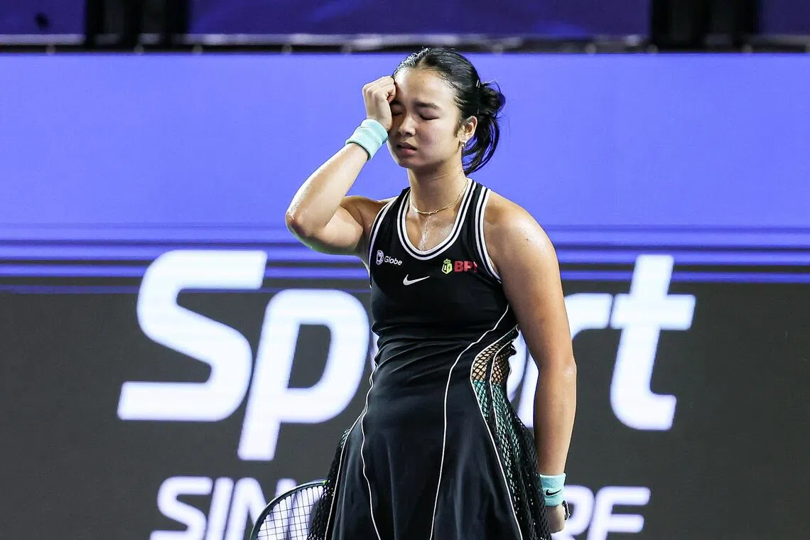 A dejected Alexandra Eala during her shock loss to Tatiana Prozorova in last week’s Singapore Tennis Open. She was upset again by a lower-ranked player in the Asian Games semi-finals on Oct 1.