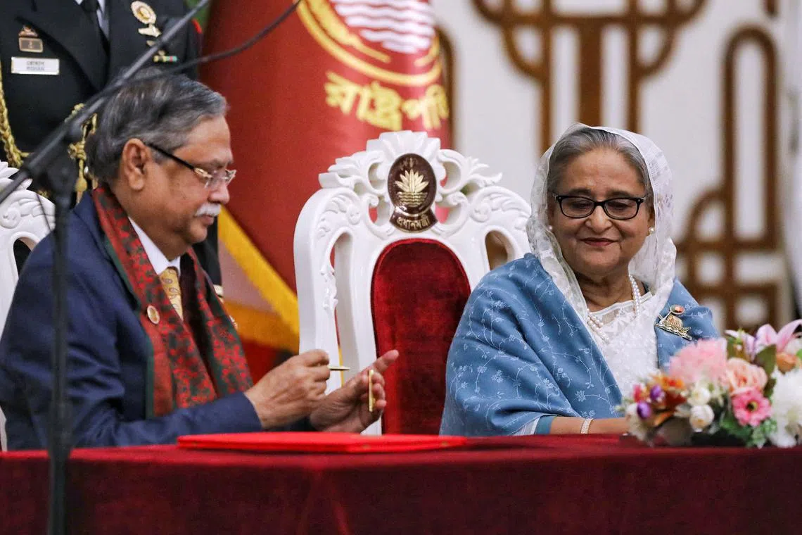 FILE PHOTO: Bangladeshi President Mohammed Shahabuddin administers Prime Minister Sheikh Hasina's oath-taking ceremony as the country's Prime Minister in Dhaka, Bangladesh, January 11, 2024. REUTERS/Mohammad Ponir Hossain/File Photo
