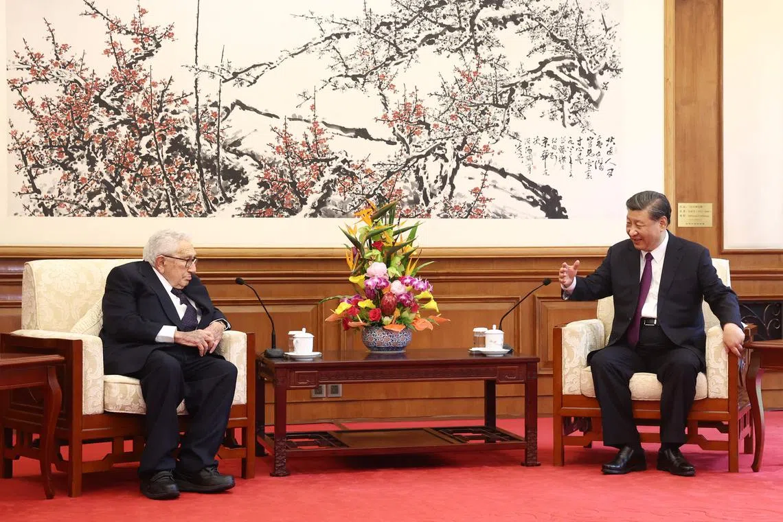 Chinese President Xi Jinping (right) meets former US secretary of state Henry Kissinger in Beijing on July 20.