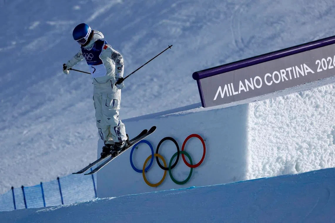 Freestyle skiing-Gu blends dragon power with China’s porcelain palette for slopestyle suit