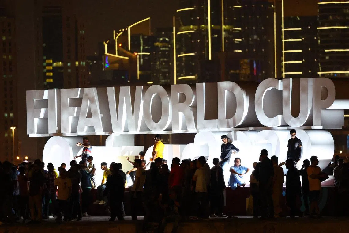 FILE PHOTO: Soccer Football - FIFA World Cup Qatar 2022 Preview, Doha, Qatar - November 18, 2022  The FIFA World Cup logo is pictured on the Corniche Promenade ahead of the FIFA World Cup Qatar 2022 REUTERS/Fabrizio Bensch/File Photo