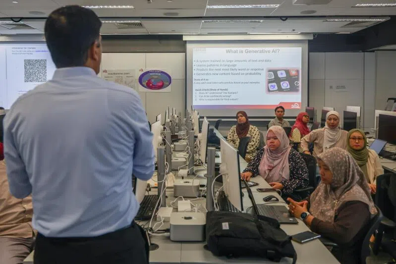 Yayasan Mendaki staff attending a generative AI (artificial intelligence) class at SUTD on March 18.