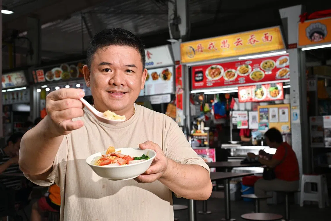 ST20241118-202495200232-Lim Yaohui-Tan Hsueh Yun-hyhawker/
Mr David Yong, 49, Owner of Tanjong Rhu Wanton Noodle stall, with his wanton noodle at Geylang East Centre Market & Food Corner on Nov 18, 2024.
Feature on hawkers selling lower-sodium food.
(ST PHOTO: LIM YAOHUI)