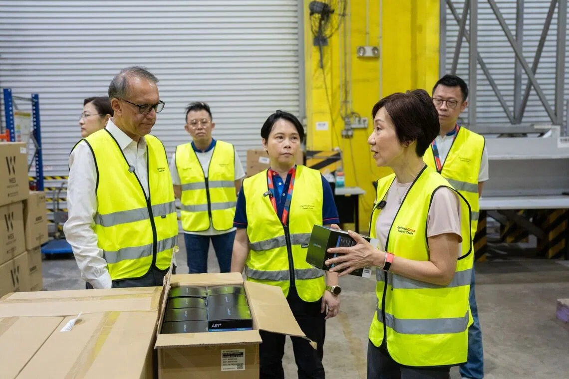 Minister for Sustainability and the Environment Grace Fu at FairPrice’s warehouse on the morning of Oct 19.