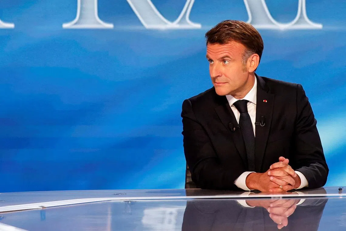 France's President Emmanuel Macron looks on as he attends a special program of the French channel TF1 in Saint-Denis, north of Paris, France, May 13, 2025.  LUDOVIC MARIN/Pool via REUTERS