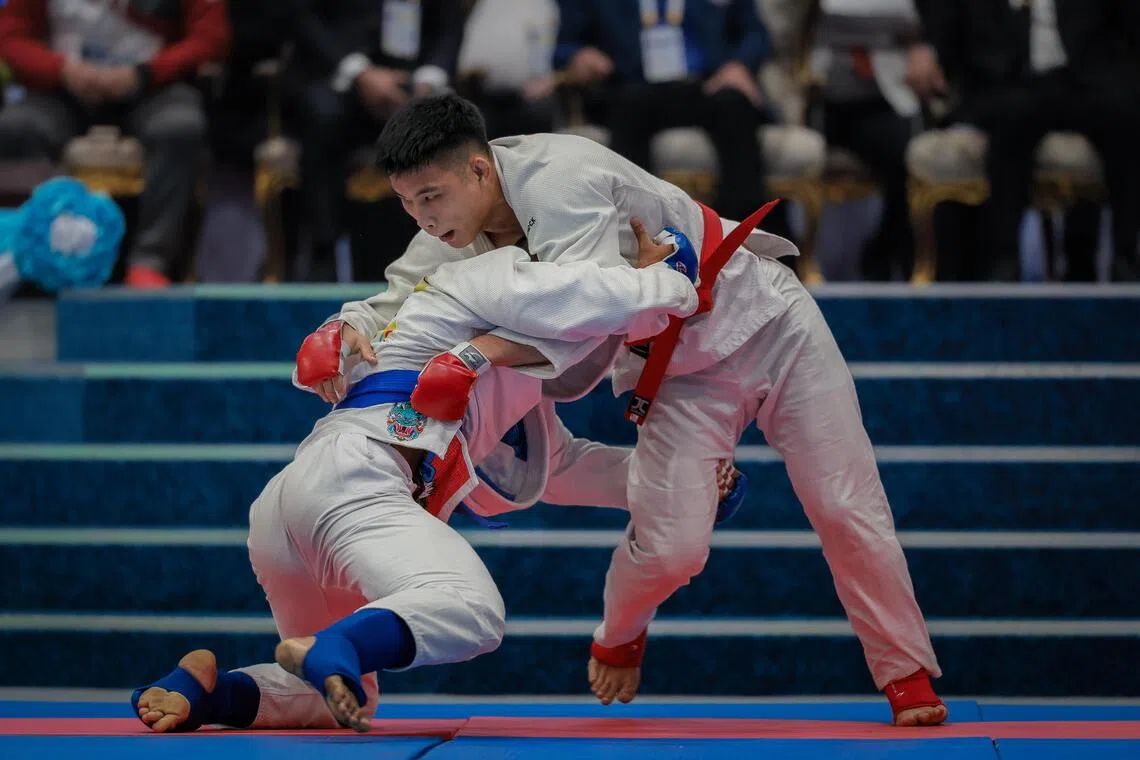 Singapore's Jedd Tan defeated world champion
Thailand Aunjai Chanwit; 
Ju-jitsu Men Fighting, 77kg, final; 
Ronnaphakat Building Navaminda Kasatriyahiraj Air Force Academy during the Thailand Southeast Asian Games in Bangkok on Dec 10, 2025.