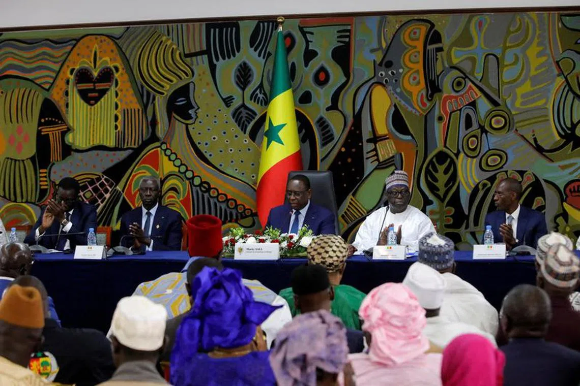 FILE PHOTO: Senegal's president Macky Sall attends a national dialogue that aims easing political tension and violence ahead of the February 2024 presidential election in Dakar, Senegal May 31, 2023. REUTERS/Ngouda Dione/File Photo