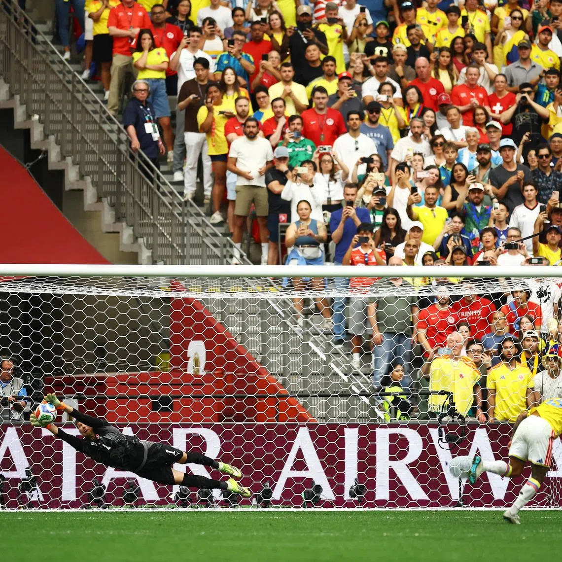 Soccer Football - FIFA World Cup 2026 - Round of 16 - Switzerland v Colombia - BC Place, Vancouver, Canada - July 7, 2026 Colombia's Cucho Hernandez has his penalty saved by Switzerland's Gregor Kobel during the penalty shootout REUTERS/Albert Gea