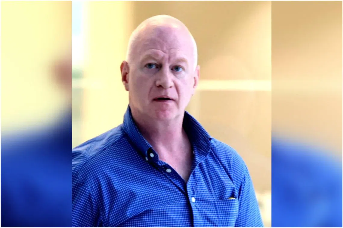 Greg Austin Lynn, an American, was handed four charges on Thursday, including two counts of harassment.