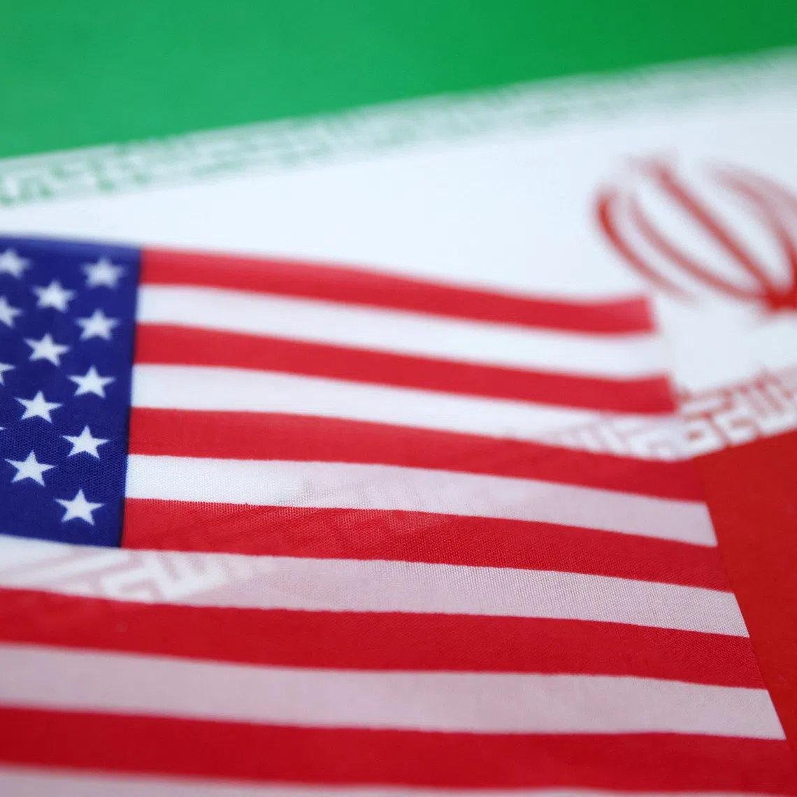 U.S. and Iran flags are seen in this illustration taken June 18, 2025. REUTERS/Dado Ruvic/Illustration
