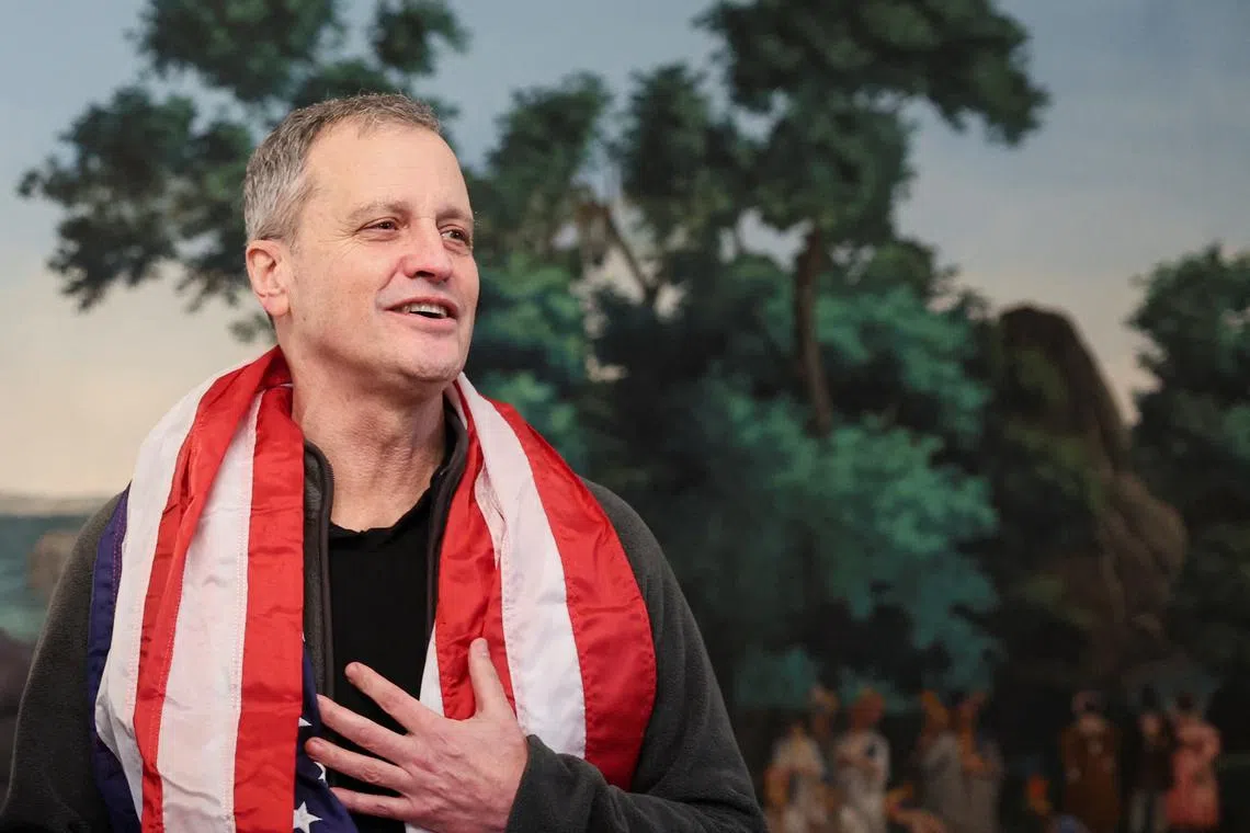 FILE PHOTO: Released American schoolteacher Marc Fogel reacts during an event held by U.S. President Donald Trump to welcome back Fogel, who had been held in Russia since 2021, at the White House in Washington, D.C., U.S., February 11, 2025.  REUTERS/Kevin Lamarque/File Photo