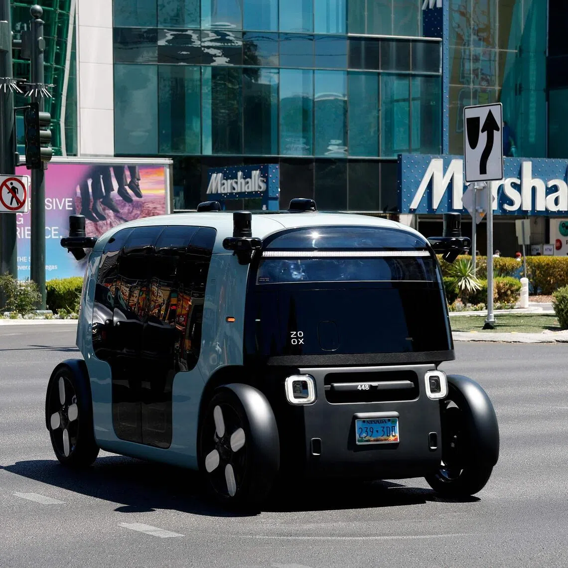 LAS VEGAS, NEVADA - AUGUST 07: An Amazon Zoox driverless robotaxi drives on the Las Vegas Strip on August 07, 2025 in Las Vegas, Nevada. Amazon's autonomous vehicle company Zoox is actively testing and preparing to launch its robotaxi service in Las Vegas and has partnered with Resorts World Las Vegas to become the resort's official robotaxi partner.   Justin Sullivan/Getty Images/AFP (Photo by JUSTIN SULLIVAN / GETTY IMAGES NORTH AMERICA / Getty Images via AFP)