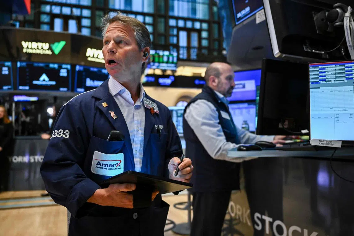 Traders working on the floor of the New York Stock Exchange, in New York City, on April 8.