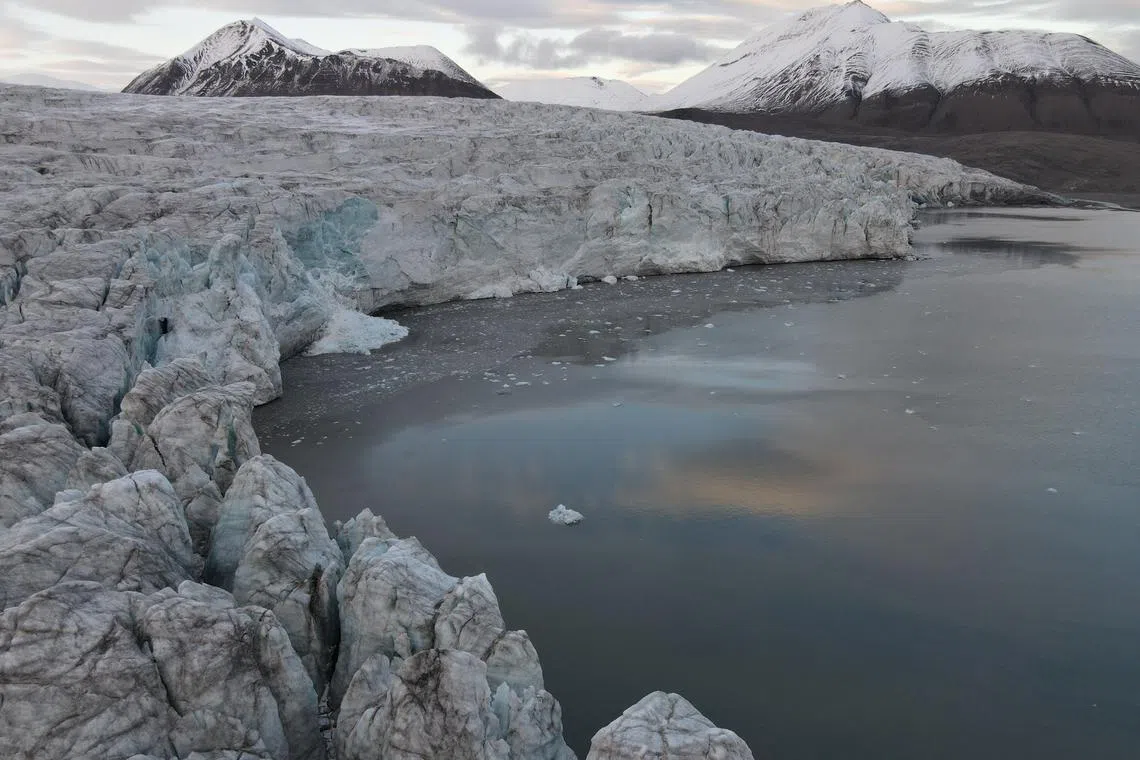 FILE PHOTO: A view of the Esmarkbreen glacier on Spitsbergen island, part of the Svalbard archipelago in northern Norway, September 24, 2020. Picture taken with a drone on September 24, 2020. REUTERS/Natalie Thomas/File Photo