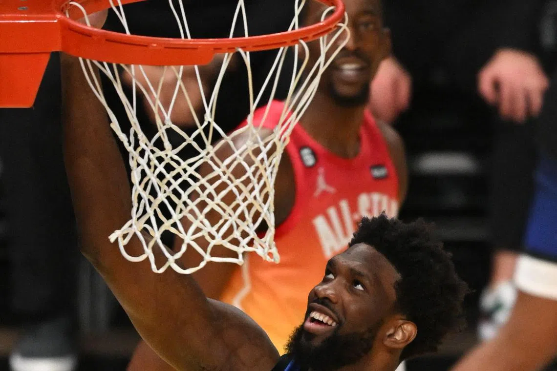 Philadelphia 76ers' Joel Embiid scoring during the NBA All-Star game between Team Giannis and Team LeBron at the Vivint arena in Salt Lake City, Utah in February. 
