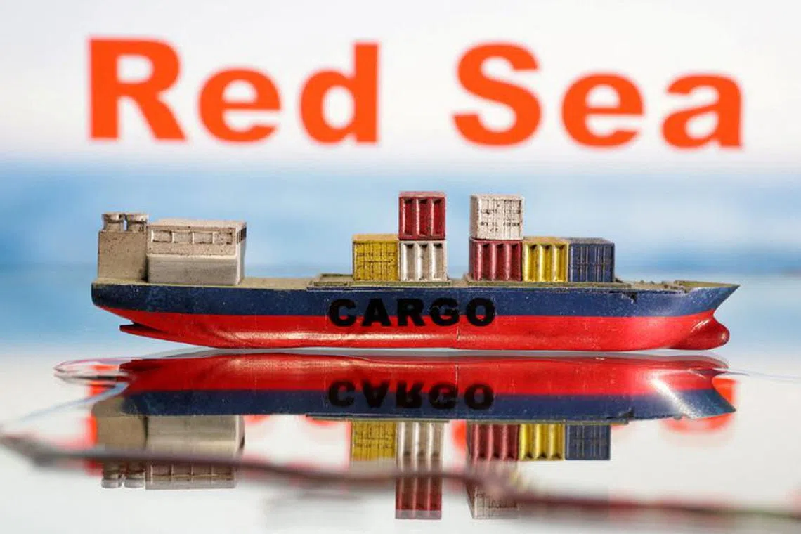 FILE PHOTO: A cargo ship boat model is seen in front of \"Red Sea\" words in this illustration taken January 9, 2024. REUTERS/Dado Ruvic/Illustration/File Photo