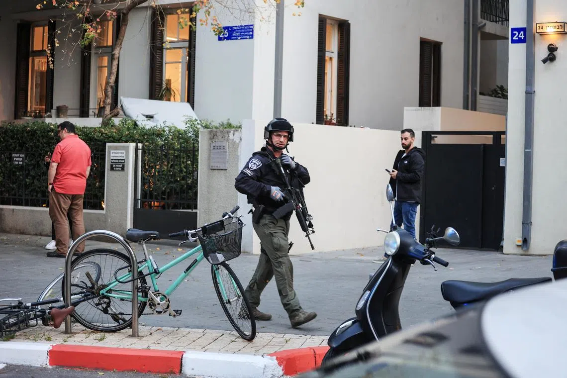 A security official attending the scene of a suspected attack in Tel Aviv, Israel, on Jan 18.