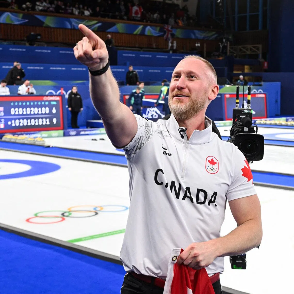 Milano Cortina 2026 Olympics - Curling - Men's Gold Medal Game - Great Britain vs Canada - Cortina Curling Olympic Stadium, Cortina d'Ampezzo, Italy - February 21, 2026. Brad Jacobs of Canada celebrates after winning gold medal against Great Britain. REUTERS/Jennifer Lorenzini