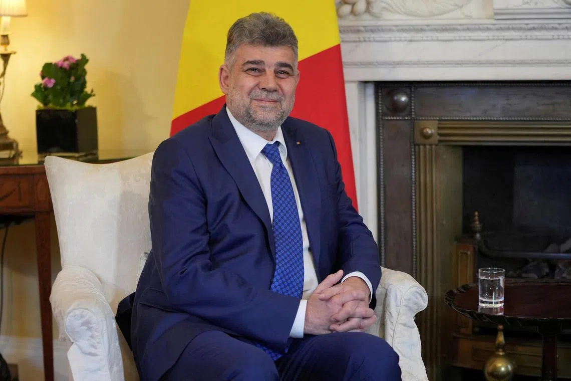 FILE PHOTO: Romania's Prime Minister Marcel Ciolacu meets Britain's Prime Minister Keir Starmer (not pictured) at 10 Downing Street in London, Britain, Nov. 13, 2024. Kin Cheung/Pool via REUTERS/File Photo