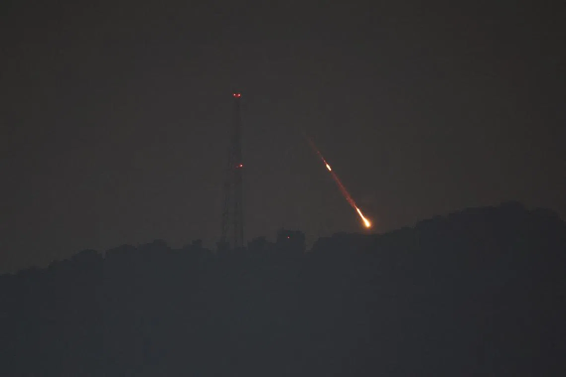 A view shows drones or missiles vying for targets at undisclosed locations in northern Israel, early April 14.