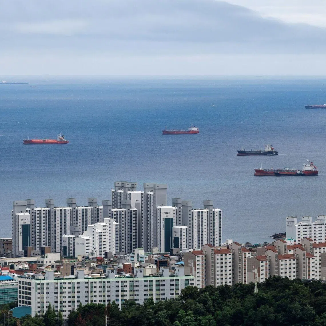 Oil tankers are moored off the coast in Ulsan, South Korea, on June 25.