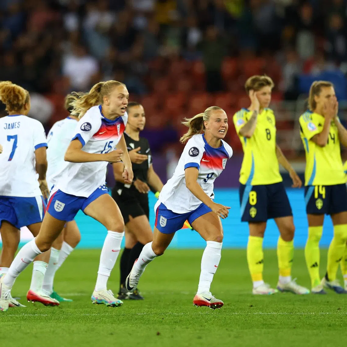 Soccer Football - UEFA Women's Euro 2025 - Quarter Final - Sweden v England - Stadion Letzigrund, Zurich, Switzerland - July 17, 2025 England's Alessia Russo, England's Esme Morgan and England's Beth Mead celebrate winning the penalty shootout REUTERS/Matthew Childs