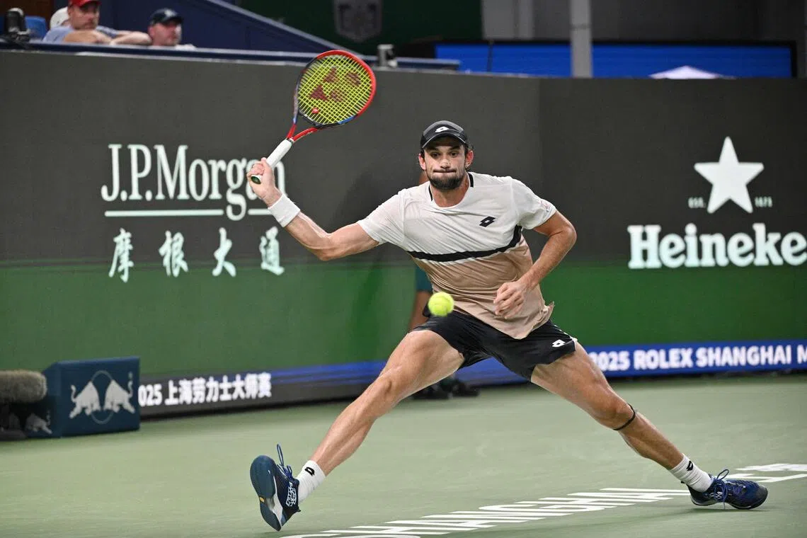 Monaco's Valentin Vacherot hits a return to Serbia's Novak Djokovic during their semi-final match at the Shanghai Masters.