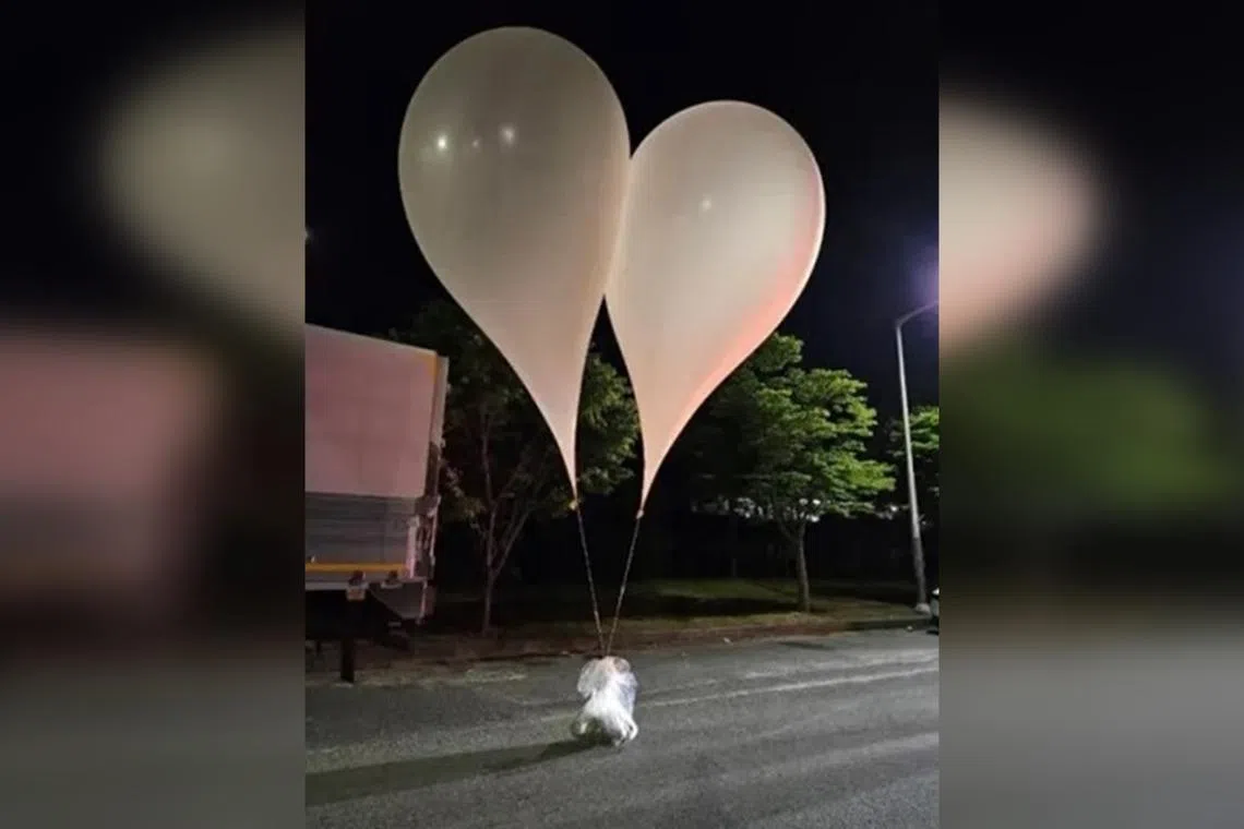 Balloons filled with garbage and dirt sent from North Korea, seen in the southern province of Chungcheong, South Korea.