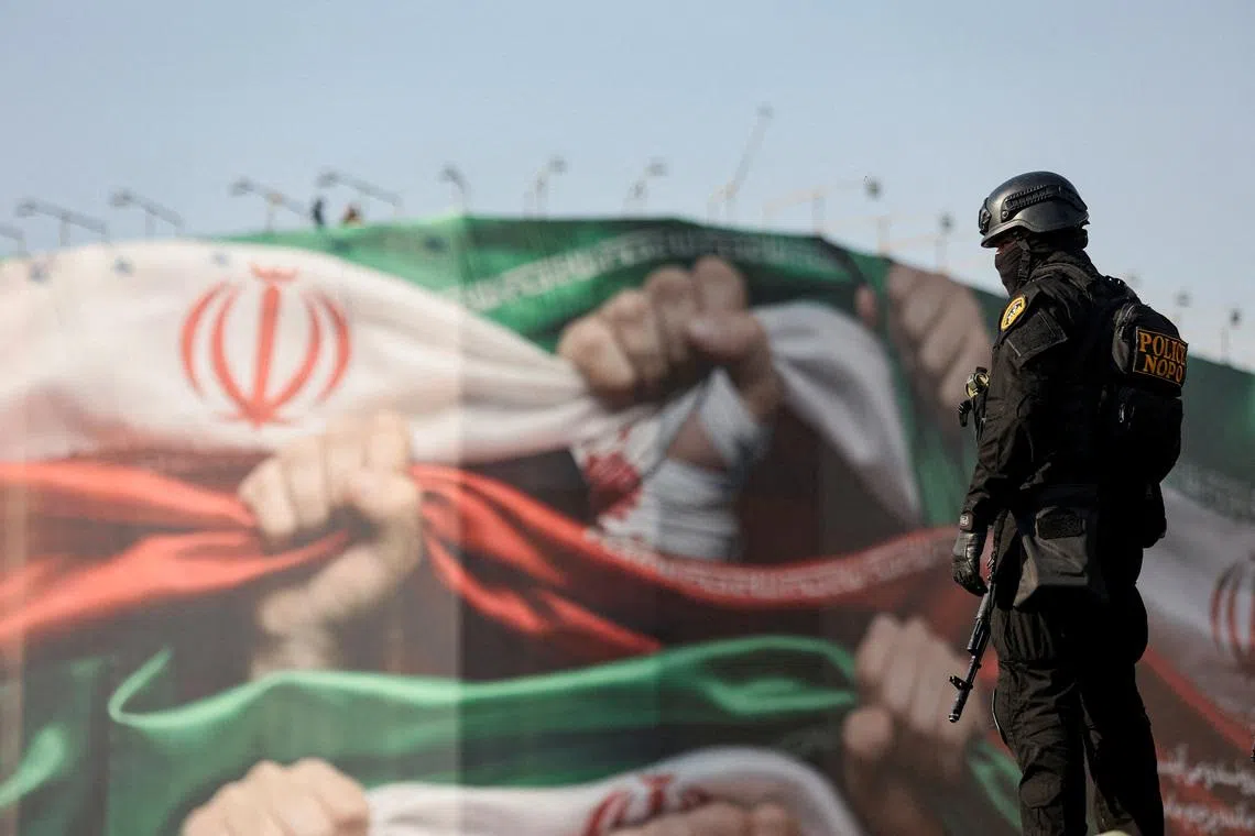 A member of the Iranian police attends a pro-government rally in Tehran, Iran, January 12, 2026. Stringer/WANA (West Asia News Agency) via REUTERS