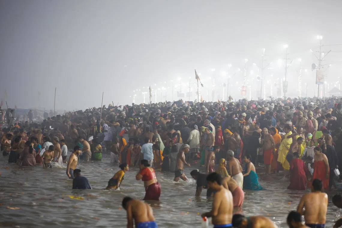 Saffron-robed monks and naked ash-smeared ascetics roamed the crowds offering blessings to devotees, many of whom had walked for weeks to reach the site.