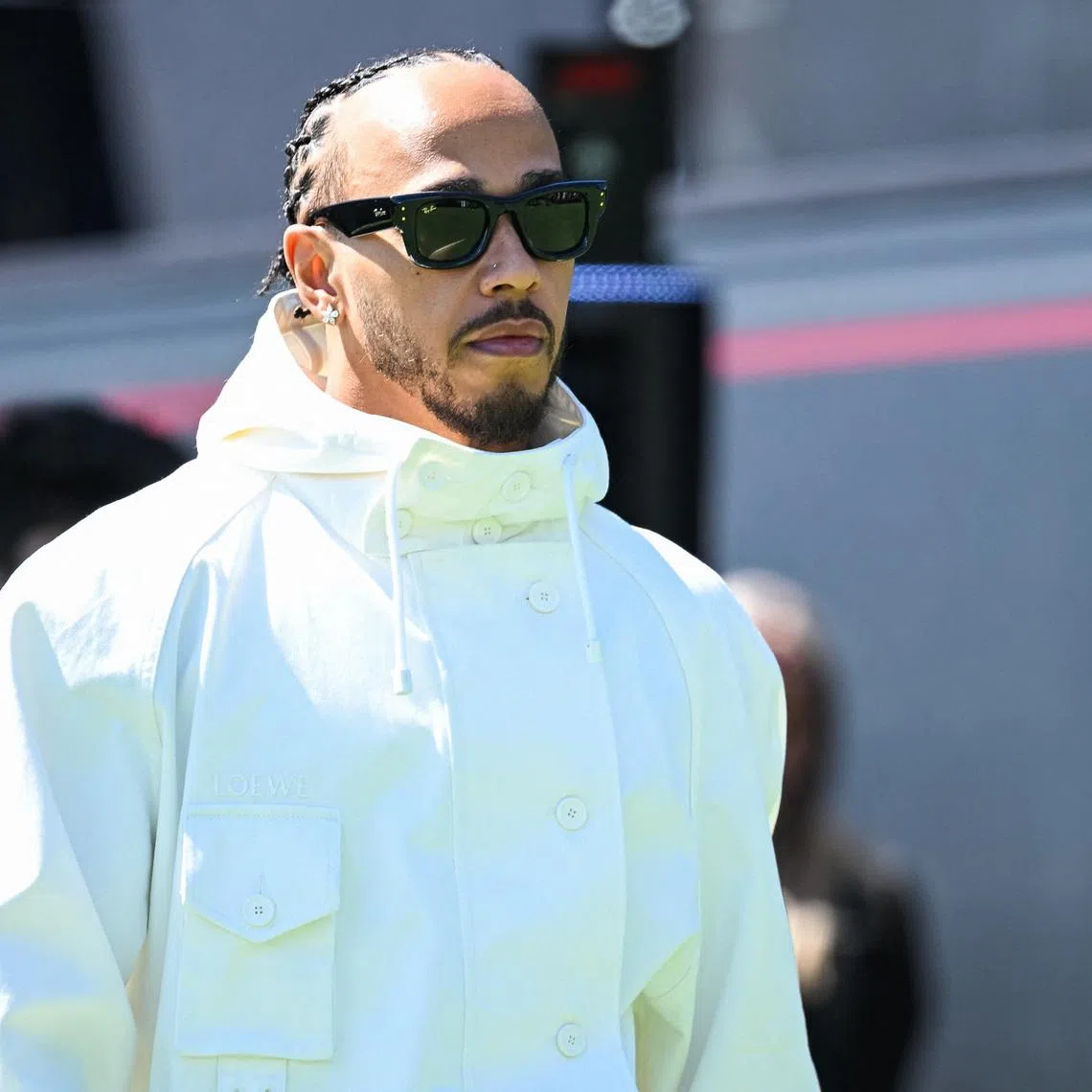 May 21, 2026; Montreal, Quebec, CANADA; Ferrari driver Lewis Hamilton (44) arrives to the paddock area at Circuit Gilles-Villeneuve. Mandatory Credit: David Kirouac-Imagn Images