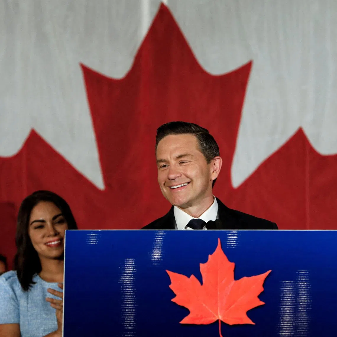 Canada's federal Conservative leader Pierre Poilievre takes the podium after winning a by-election in Alberta's Battle River-Crowfoot riding, after he lost his long-held Ottawa constituency in the general election, in Camrose, Alberta, Canada, August 18, 2025.  REUTERS/Amber Bracken