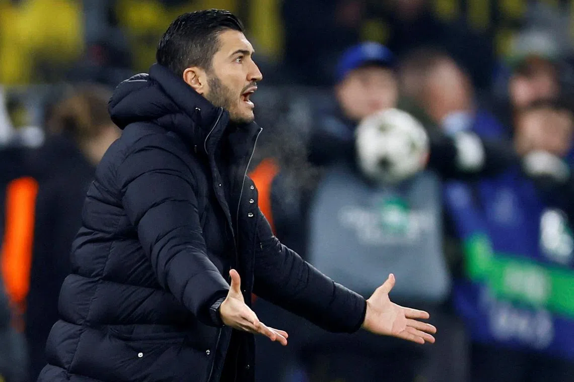 FILE PHOTO: Soccer Football - Champions League - Borussia Dortmund v FC Barcelona - Signal Iduna Park, Dortmund, Germany - December 11, 2024 Borussia Dortmund coach Nuri Sahin reacts REUTERS/Wolfgang Rattay/File Photo