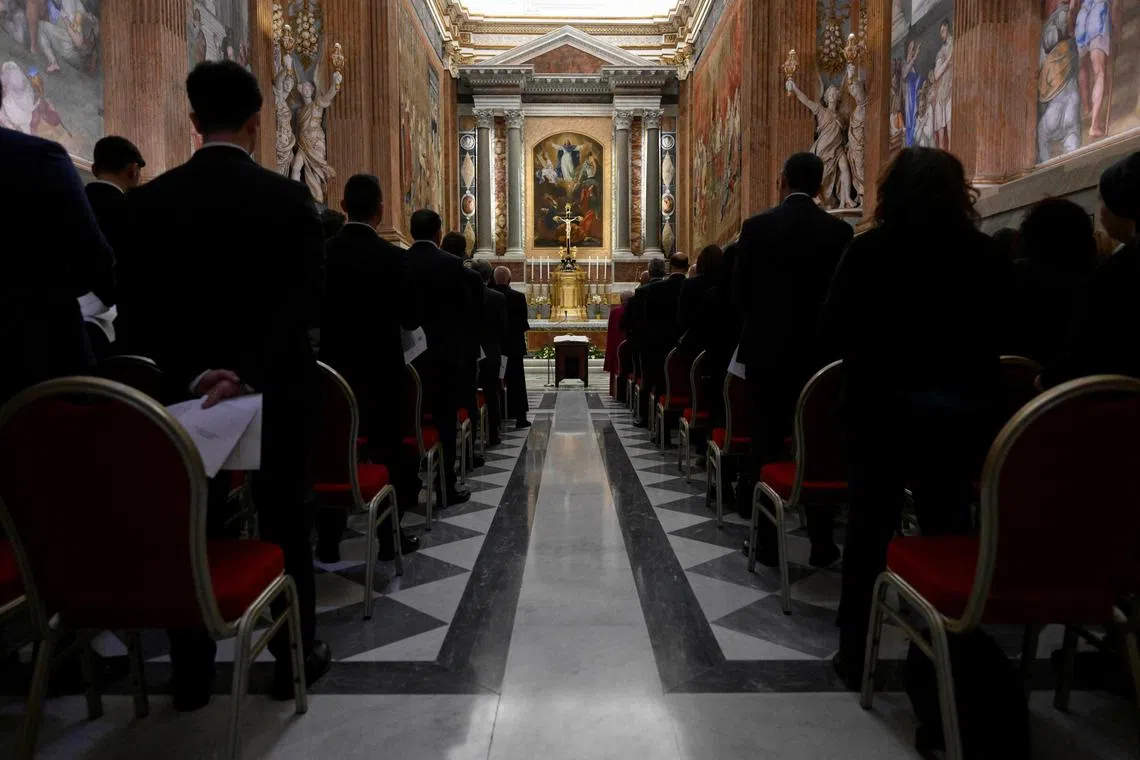 Officials, members of the clergy and Conclave staff take Oath of Secrecy in Pauline Chapel, at the Vatican, May 5, 2025. Vatican Media/­Handout via REUTERS/File Photo