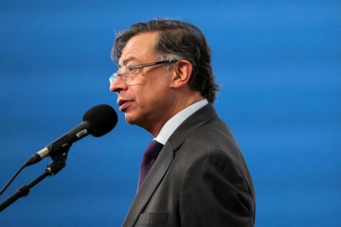 FILE PHOTO: Colombia's President Gustavo Petro speaks to the press as he arrives at the summit \"In defence of democracy\" in Barcelona, Spain, April 18, 2026. REUTERS/Nacho Doce/File Photo