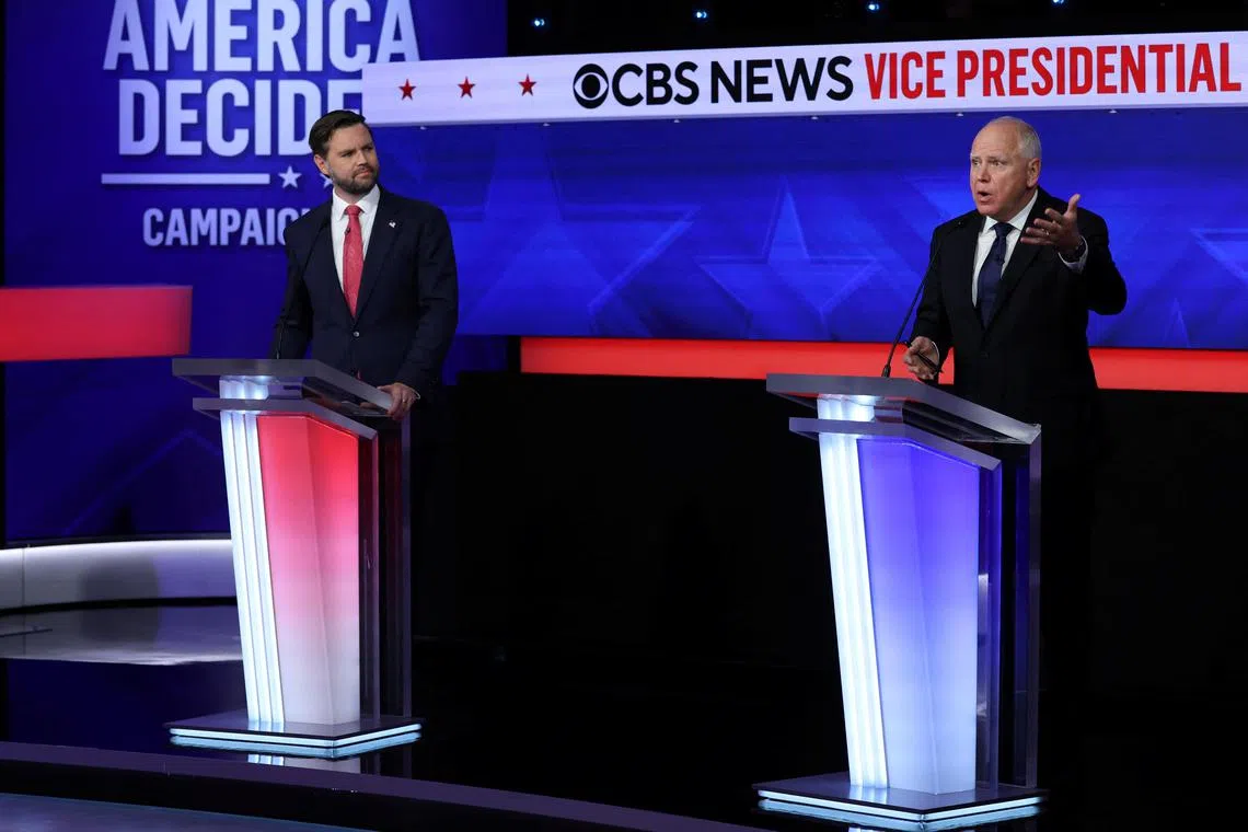 Democratic vice presidential nominee Minnesota Governor Tim Walz speaks during a debate with Republican vice presidential nominee U.S. Senator JD Vance (R-OH) hosted by CBS in New York, U.S., October 1, 2024. REUTERS/Mike Segar