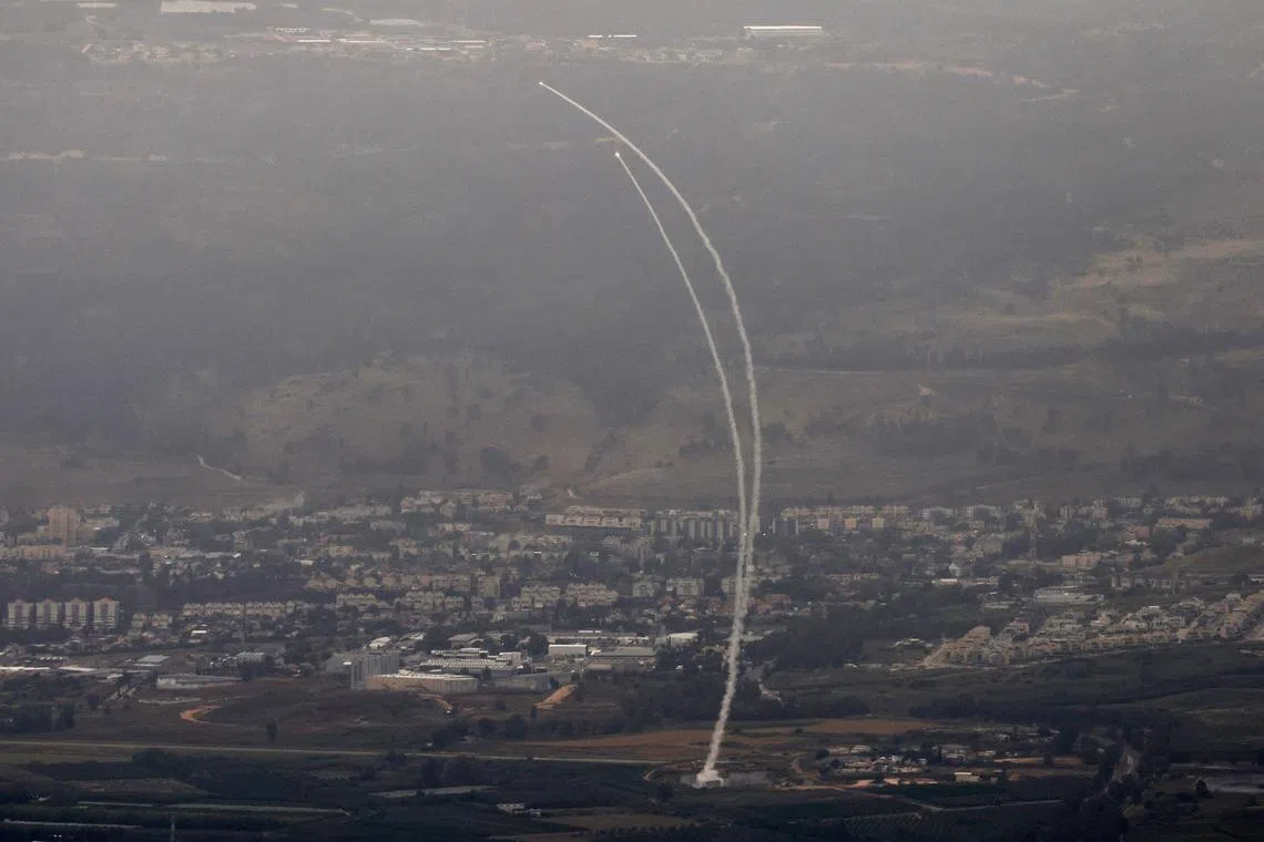 Israel's Iron Dome missile defence system launching to intercept rockets being fired from Lebanon, next to the northern Israel city of Kiryat Shmona, near the Lebanon border, on May 10, 2024, amid ongoing cross-border clashes between Israeli troops and Hezbollah fighters. 