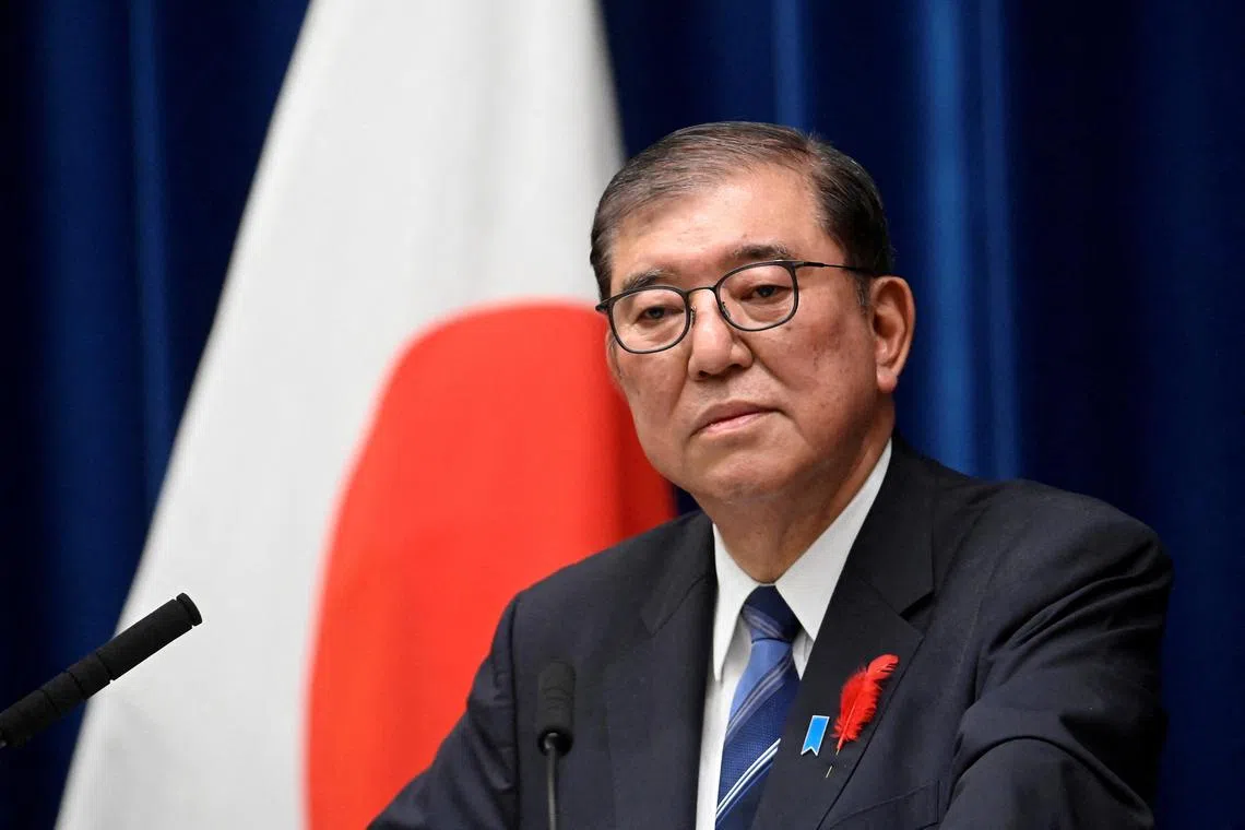Japanese PM Shigeru Ishiba is on the defence, after a scandal shook the Liberal Democratic Party.