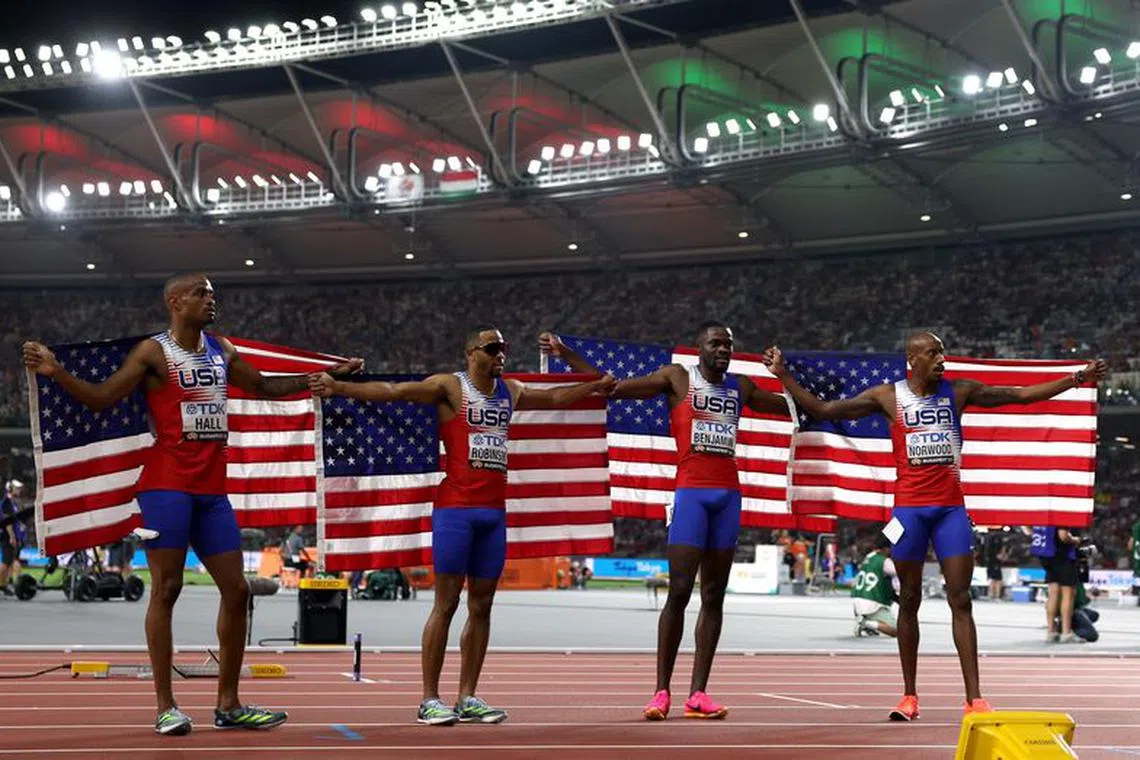 Athletics - World Athletics Championship - Men's 4x400m Relay Final - National Athletics Centre, Budapest, Hungary - August 27, 2023 Quincy Hall, Justin Robinson, Rai Benjamin and Vernon Norwood of the U.S. celebrate after winning the Men's 4x400m Relay REUTERS/Sarah Meyssonnier