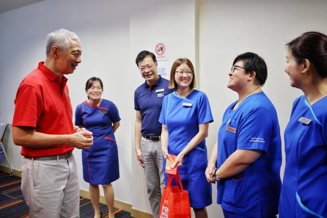 PM Lee Hsien Loong meeting healthcare workers at Ng Teng Fong General Hospital, on Feb 9, 2024.