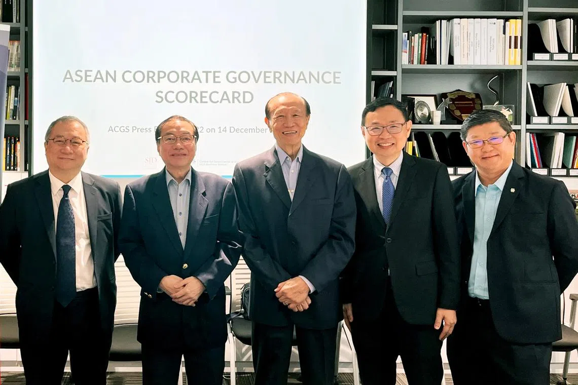 (From left) Mr Derek Koh, Professor Lawrence Loh, Mr John Lim, Mr Tong Yew Heng and Mr Chan Kok Seong.