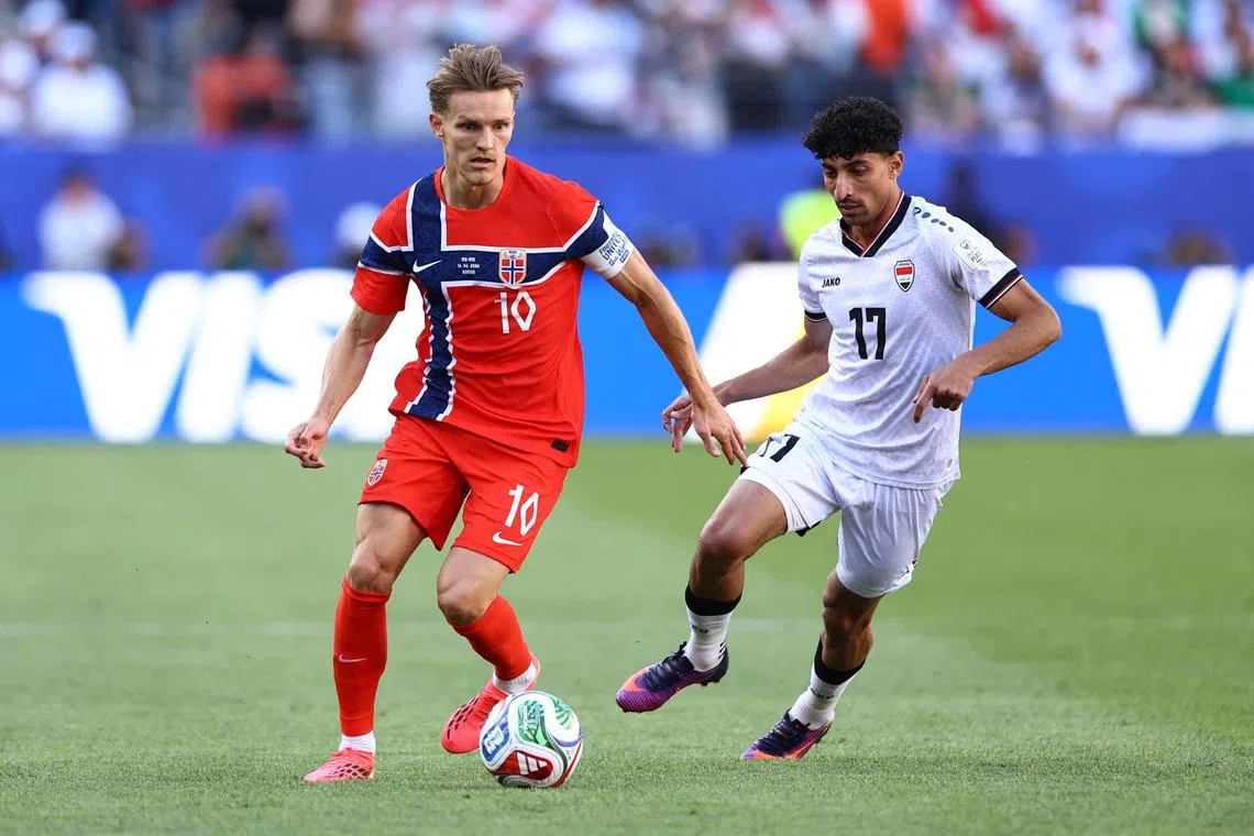 Soccer Football - FIFA World Cup 2026 - Group I - Iraq v Norway - Boston Stadium, Foxborough, Massachusetts, U.S. - June 16, 2026 Norway's Martin Odegaard in action with Iraq's Ali Jasim REUTERS/Peter Cziborra