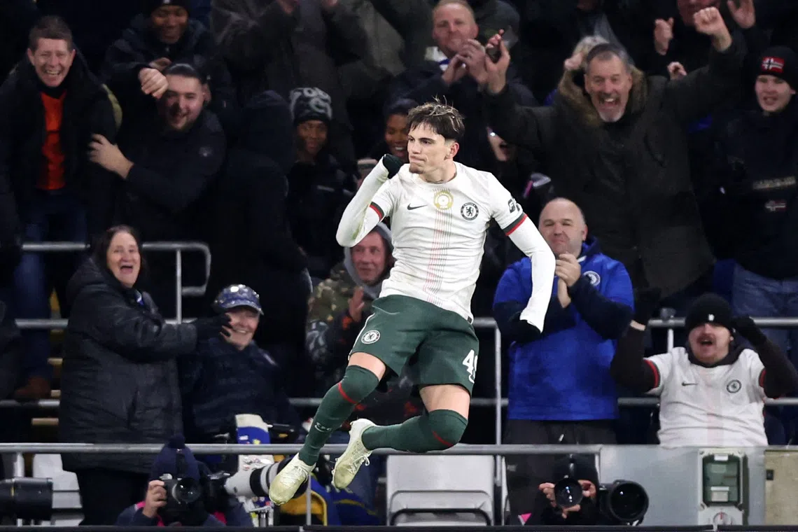 Soccer Football - Carabao Cup - Quarter Final - Cardiff City v Chelsea - Cardiff City Stadium, Cardiff, Wales, Britain - December 16, 2025 Cherlsea's Alejandro Garnacho celebrates scoring their third goal REUTERS/David Klein
