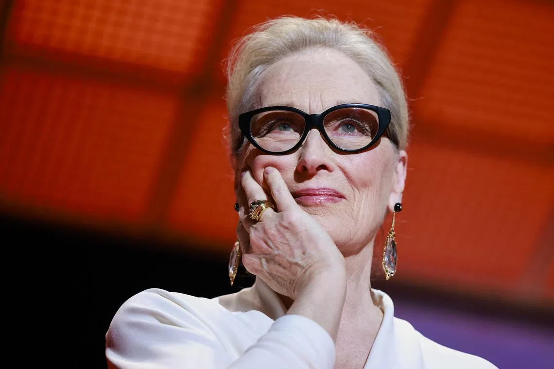 FILE PHOTO: Actress Meryl Streep reacts during the opening ceremony and the screening of the film \"Le deuxieme acte\" (The Second Act) Out of competition at the 77th Cannes Film Festival in Cannes, France, May 14, 2024. REUTERS/Yara Nardi/File Photo