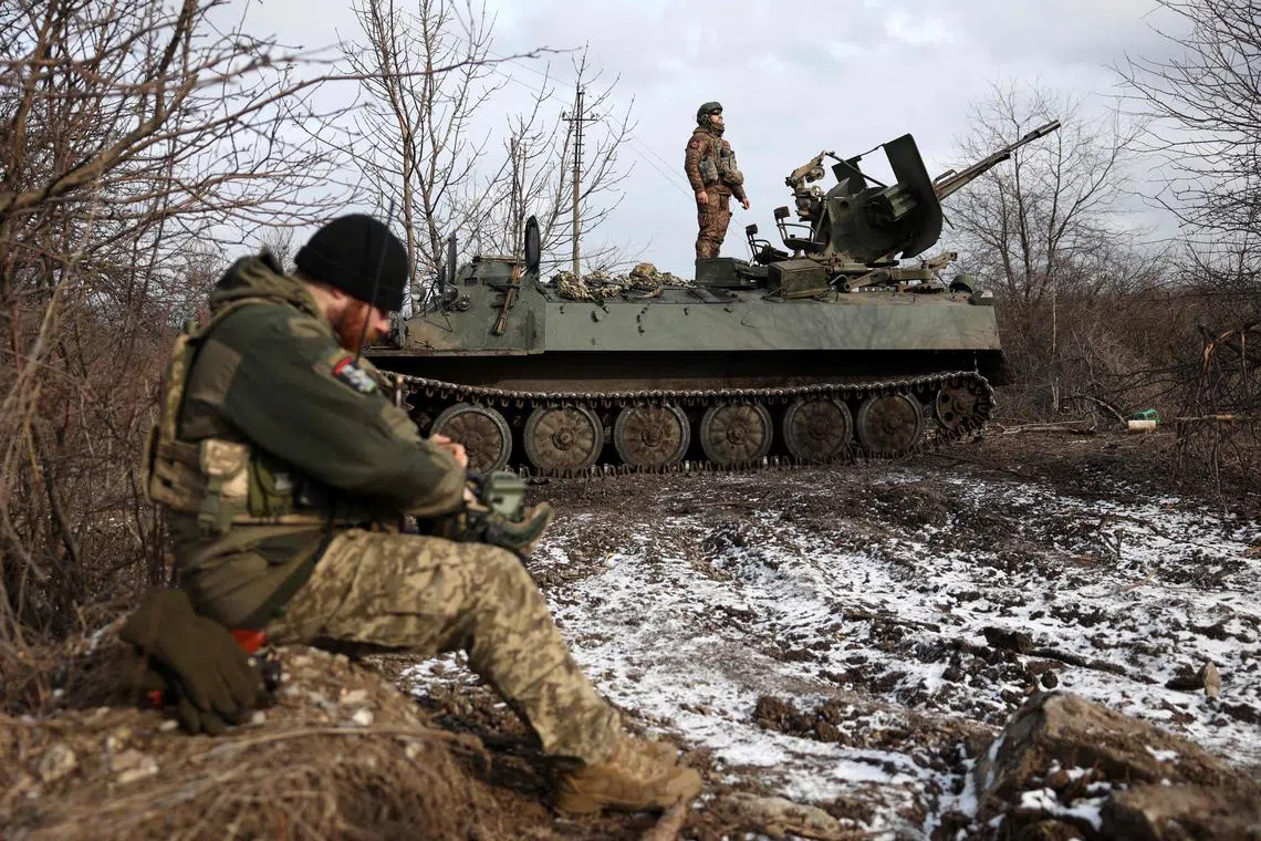 Ukrainian anti-aircraft gunners monitor the sky from their positions in the direction of Bakhmut, in Ukraine's Donetsk region.