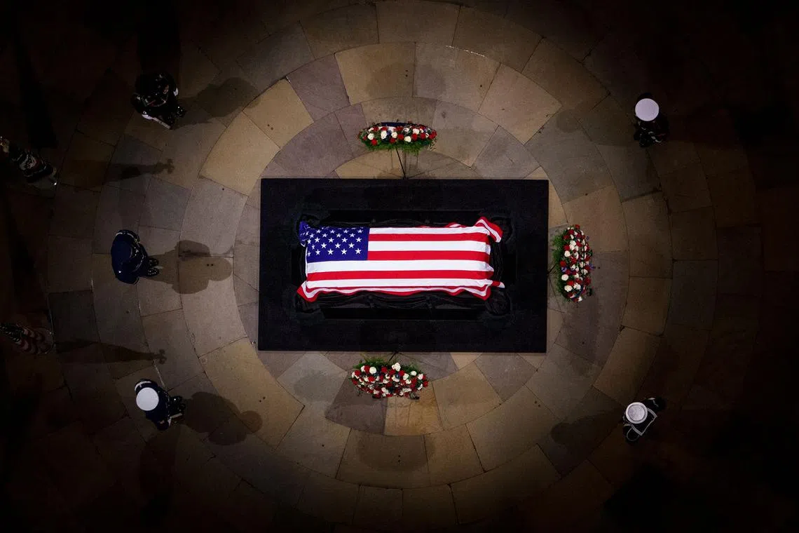 A military guard of honour standing next to the flag-draped casket of former US President Jimmy Carter during the Lying in State Ceremony at the US Capitol Rotunda in Washington, DC on Jan 7, 2025. Carter, the 39th President of the United States, died at the age of 100 on Dec 29, 2024 at his home in Plains, Georgia. 